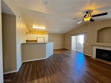 Unfurnished living room featuring dark wood-style