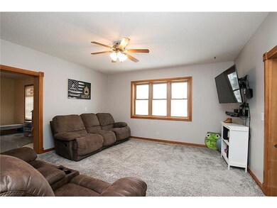 Living room. Hardwood floors under carpet on the m