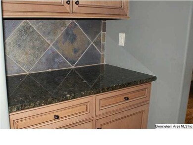 There's a butlers pantry between the dining room a