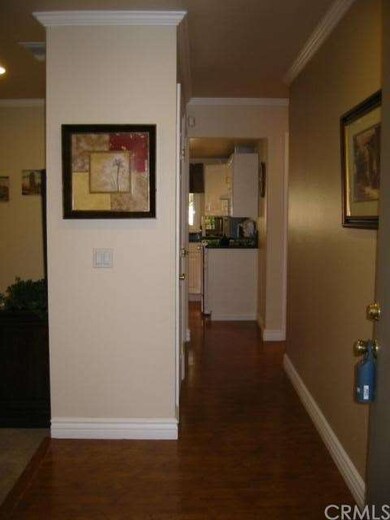 LOOKING IN FROM THE FRONT DOOR, TO YOUR LEFT LIVIN