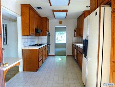 Kitchen viewed from back door.