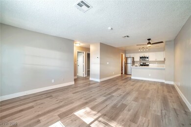 Unfurnished living room featuring light wood finis