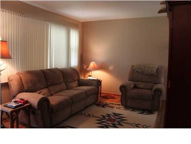 Large Living with big picture window overlooking c