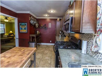 Cozy Kitchen with Mosaic Tile Backsplash, Tile Flo
