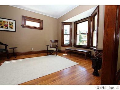 Living Room. Great natural light and beautiful ori
