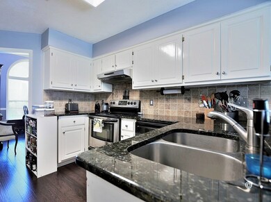 Kitchen with granite countertops