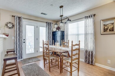OPEN DINING/BREAKFAST AREA WITH NEW LIGHTING