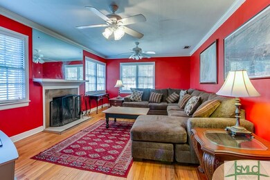 This living room is complete with a large sectiona