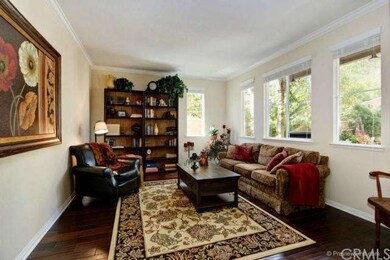 Formal Living room with Distressed Hardwood Floori
