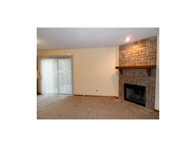 Family Room with cozy stone fireplace