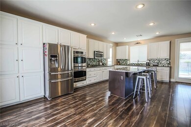 Gourmet kitchen with SS appliances, island, double
