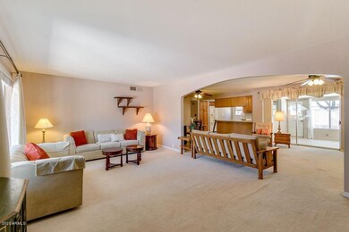 Living room adjoins family room