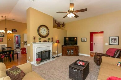 The living room is adjacent to the eat-in area and the kitchen. Perfect for entertaining. Also, great area for the family to gather.