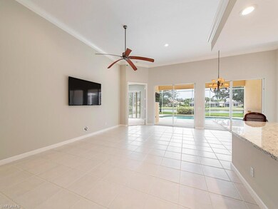 Larger Great Room with view of lake, crown molding