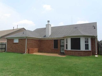 Spacious fenced-in back yard.
