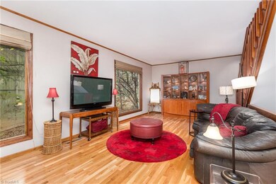 Beautiful wood floors and large windows throughout this home