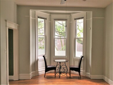 This charming window in this combined living/dinin