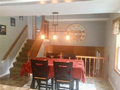 The dining area that opens to the finished lower l