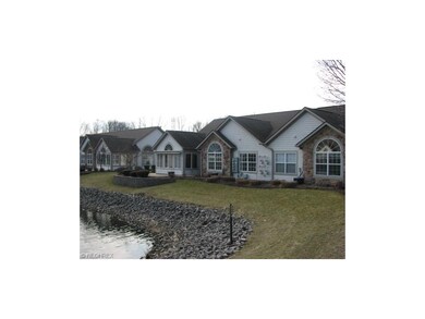 View of residence from across the lake.