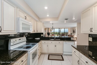 Open kitchen overlooking living/dining