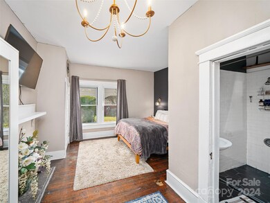 Primary bedroom with attached primary bathroom