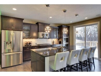 Gourmet kitchen with SS appliances, double ovens, 