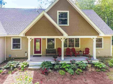 Covered porch with ceiling fan to enjoy no matter 