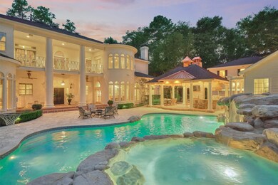 Embrace the lifestyle in this magnificently designed home - ample room for al fresco dining, lounging areas around the pool & spa, ventilation on the veranda, supreme comfort in the gazebo with misting systems, elaborate outdoor kitchen, and special quarters in the pool house and gazebo!