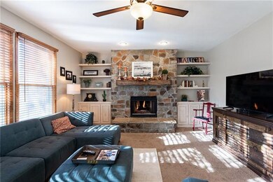 Stone Fireplace and Built-in's bring a warmth to t