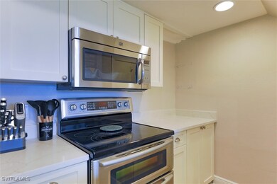 Kitchen with stainless steel appliances, light sto