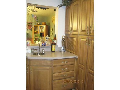 Kitchen. WET BAR W/ BUILT IN PANTRY