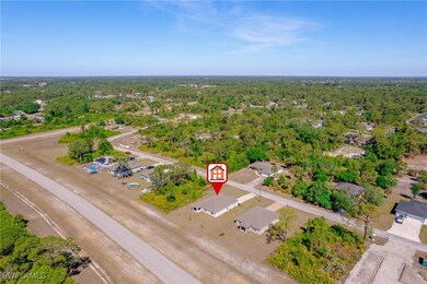 Bird's eye view with a view of trees