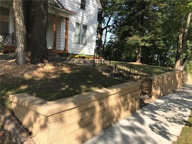 New sidewalk and retaining wall.