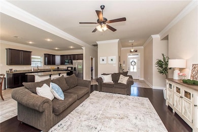 Living room to the front foyer and door