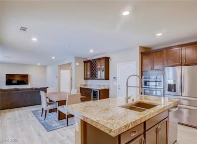 Kitchen featuring recessed lighting, visible vents
