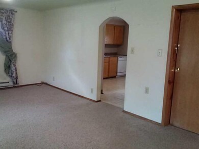 Living Room. leading to kitchen