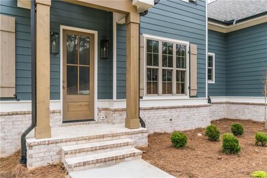 Property entrance with brick siding