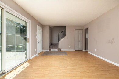 Empty room with light hardwood flooring