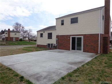 Enjoy a 28x20 concrete rear patio perfect for ente