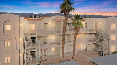 View of property featuring a mountain view and sta