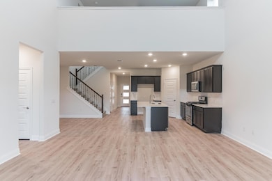 Kitchen featuring stainless steel appliances, a s