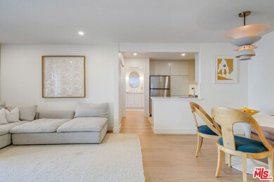 Living and dining area to kitchen