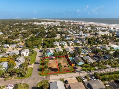 Aerial view of property's location with a nearby body of water and property boundaries highlighted