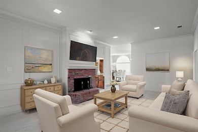 Living area with woodburning fireplace. large windows with the view of the backyard and porch