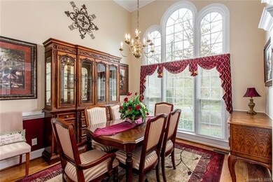 Dining Room with large window and custom window tr