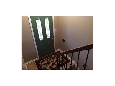 Stained glass look in front door & ceramic tile en