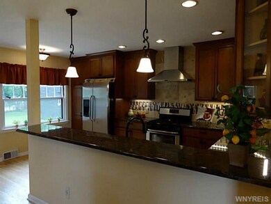 Kitchen. ...Heavy duty breakfast bar fits party of