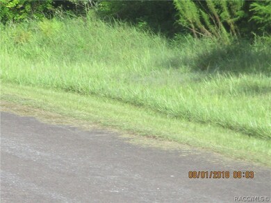 Paved County road in front of property
