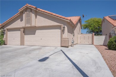 3 car garage PLUS separate gated RV parking space.