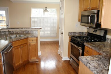 A view of the kitchen to breakfast room.